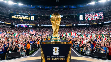 Football Trophy On Stadium Podium Scaled with crowd background, ideal for sports events, transparent background PNG.
