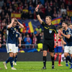 Referee Showing Red Card Football Scaled image of a referee issuing a red card in a match, perfect for sports analysis and articles, transparent background PNG.