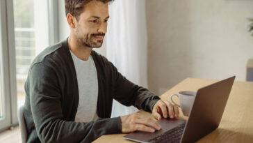 Professional Woman Working From Home Laptop Home Office, modern setting, remote work PNG
